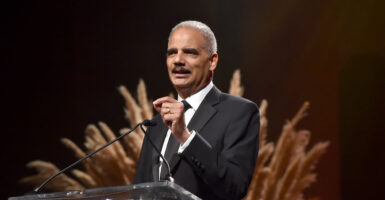 SANTA MONICA, CALIFORNIA - OCTOBER 10: 82nd Attorney General of the U.S. Eric Holder speaks onstage during City Of Hope Spirit Of Life Gala 2019 on October 10, 2019 in Santa Monica, California.