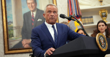 HHS Secretary Robert F. Kennedy, Jr. at a podium.