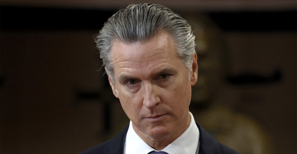 SAN FRANCISCO, CALIFORNIA - JANUARY 16: California Gov. Gavin Newsom looks on during a press conference at Friendship House Association of American Indians on January 16, 2026 in San Francisco, California. California Gov. Gavin Newsom joined San Francisco Mayor Daniel Lurie to announce new funding for homelessness and mental health efforts in the city of San Francisco. The governor announced more than $420 million in new state funding for San Francisco, Los Angeles, and San Diego as part of the state's HHAP 6 funding, which goes toward helping local programs end homelessness through interim or permanent housing and supportive services. (Photo by Justin Sullivan/Getty Images)
