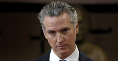 SAN FRANCISCO, CALIFORNIA - JANUARY 16: California Gov. Gavin Newsom looks on during a press conference at Friendship House Association of American Indians on January 16, 2026 in San Francisco, California. California Gov. Gavin Newsom joined San Francisco Mayor Daniel Lurie to announce new funding for homelessness and mental health efforts in the city of San Francisco. The governor announced more than $420 million in new state funding for San Francisco, Los Angeles, and San Diego as part of the state's HHAP 6 funding, which goes toward helping local programs end homelessness through interim or permanent housing and supportive services. (Photo by Justin Sullivan/Getty Images)