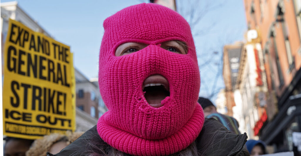 WASHINGTON, DISTICT OF COLUMBIA, UNITED STATES - 2026/01/30: A demonstrator shouts anti-ICE slogans while participating in a protest. Protesters gathered to demand the removal of Immigration and Customs Enforcement (ICE) from the capital and to call for federal accountability. The demonstrations follow the recent deaths of two Minnesota residents, Renee Nicole Good and Alex Pretti during separate encounters with immigration agents in Minneapolis. Their deaths have sparked nationwide protests. (Photo by Probal Rashid/LightRocket via Getty Images)
