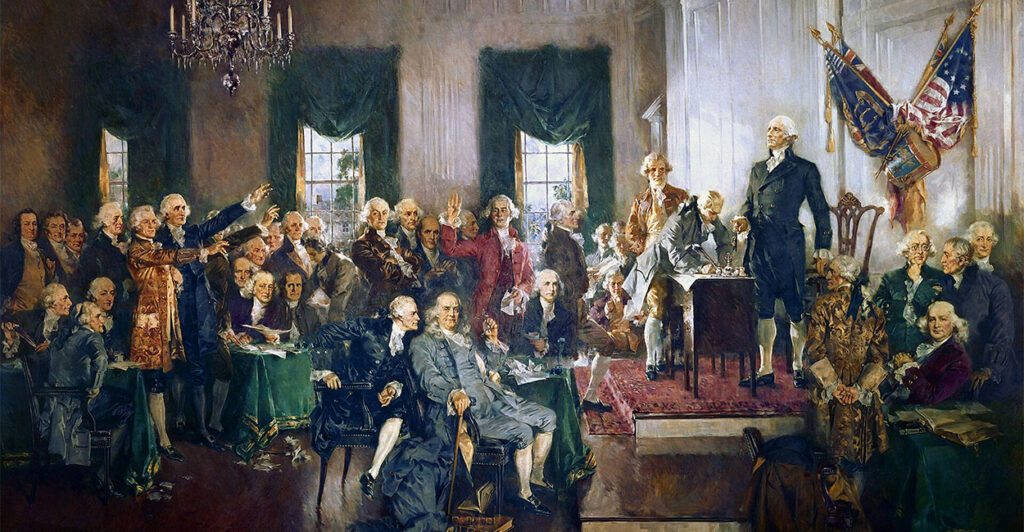 “Scene at the Signing of the Constitution of the United States,” by Howard Chandler Christy. On September 17, 1787, 39 of the 55 delegates at the constitutional convention drafted the constitution. The Constitution of the United States had to be ratified by 9 of the 13 colonies to become the supreme law of the land. By the end of 1788, 9 states had ratified the constitution. Before being dissolved, the Confederation Congress chose New York City as the first capital under the new constitution. (Photo by: Universal History Archive/Universal Images Group via Getty Images)