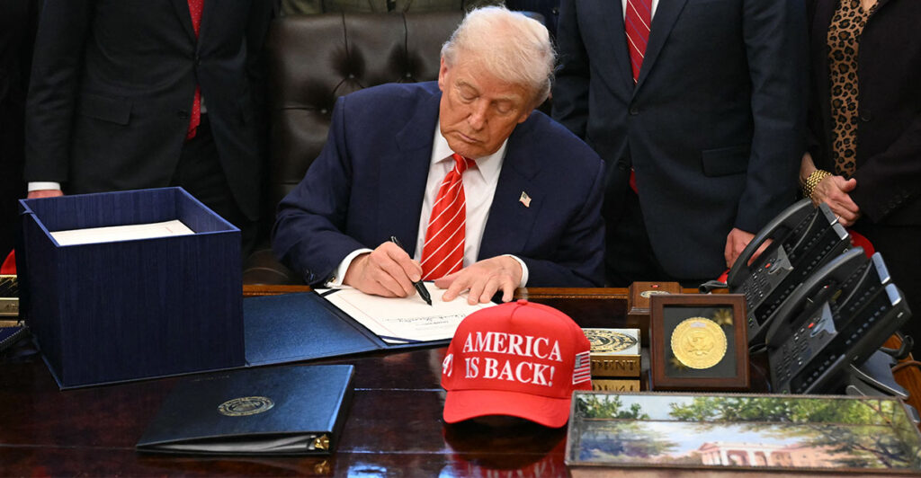 US President Donald Trump signs a funding bill to end a partial government shutdown in the Oval Office of the White House in Washington, DC, on February 3, 2026. The US House of Representatives passed a spending bill on Tuesday ending the four-day partial government shutdown sparked by Democratic opposition to funding for the federal agency carrying out President Donald Trump's immigration crackdown. (Photo by SAUL LOEB / AFP via Getty Images)