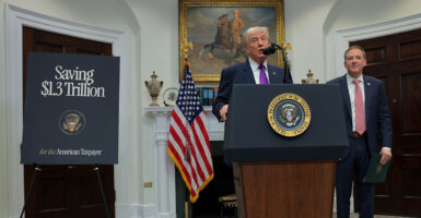 WASHINGTON, DC - FEBRUARY 12: U.S. President Donald Trump (L) speaks alongside U.S. Environmental Protection Agency Administrator Lee Zeldin during an event to announce a rollback of the 2009 Endangerment Finding in the Roosevelt Room at the White House on February 12, 2026 in Washington, DC. The Trump administration will repeal the 2009 central scientific finding that allows the EPA to regulate climate-warming emissions. (Photo by Anna Moneymaker/Getty Images)