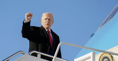 FORT BRAGG, NORTH CAROLINA - FEBRUARY 13: U.S. President Donald Trump boards Air Force One at Pope Army Airfield after a visit to the Fort Bragg U.S. Army base on February 13, 2026 in Fort Bragg, North Carolina. Trump visited the base to honor special forces involved in the military operation in Venezuela in early 2026. (Photo by Nathan Howard/Getty Images)