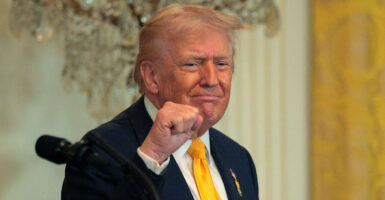 WASHINGTON, DC - FEBRUARY 18: U.S. President Donald Trump gestures as he departs a Black History Month reception in the East Room of the White House on February 18, 2026 in Washington, DC. The president issued a proclamation recognizing Black History Month on Feb. 3. (Photo by Chip Somodevilla/Getty Images)