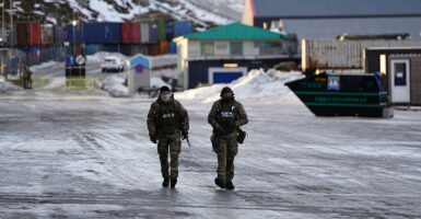 Soldiers are pictured as they guard the harbor in Nuuk, Greenland, on January 25, 2026. (Photo by Mads Claus Rasmussen / Ritzau Scanpix / AFP via Getty Images) / Denmark OUT