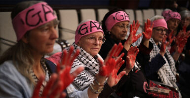 WASHINGTON, DC - NOVEMBER 08: Members of CodePink, a women's anti-war organization, protest during a hearing before the House Foreign Affairs Committee at the U.S. Capitol on November 8, 2023 in Washington, DC. The committee held a hearing on "Friend and Ally: U.S. Support for Israel after Hamas' Barbaric Attack." (Photo by Alex Wong/Getty Images)