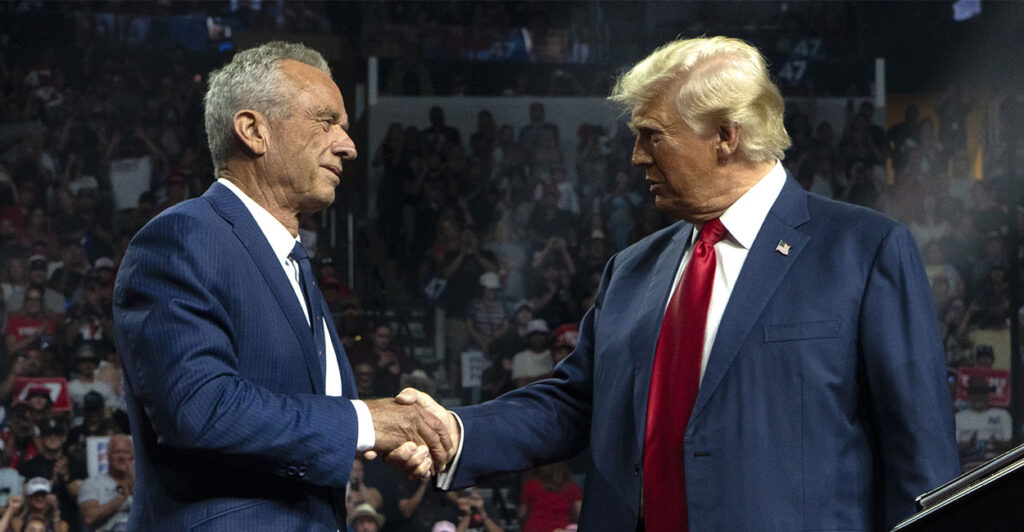 GLENDALE, ARIZONA - AUGUST 23: Former Republican presidential candidate Robert F. Kennedy Jr. and Republican presidential nominee, former U.S. President Donald Trump shake hands during a campaign rally at Desert Diamond Arena on August 23, 2024 in Glendale, Arizona. Kennedy announced today that he was suspending his presidential campaign and supporting former President Trump. (Photo by Rebecca Noble/Getty Images)