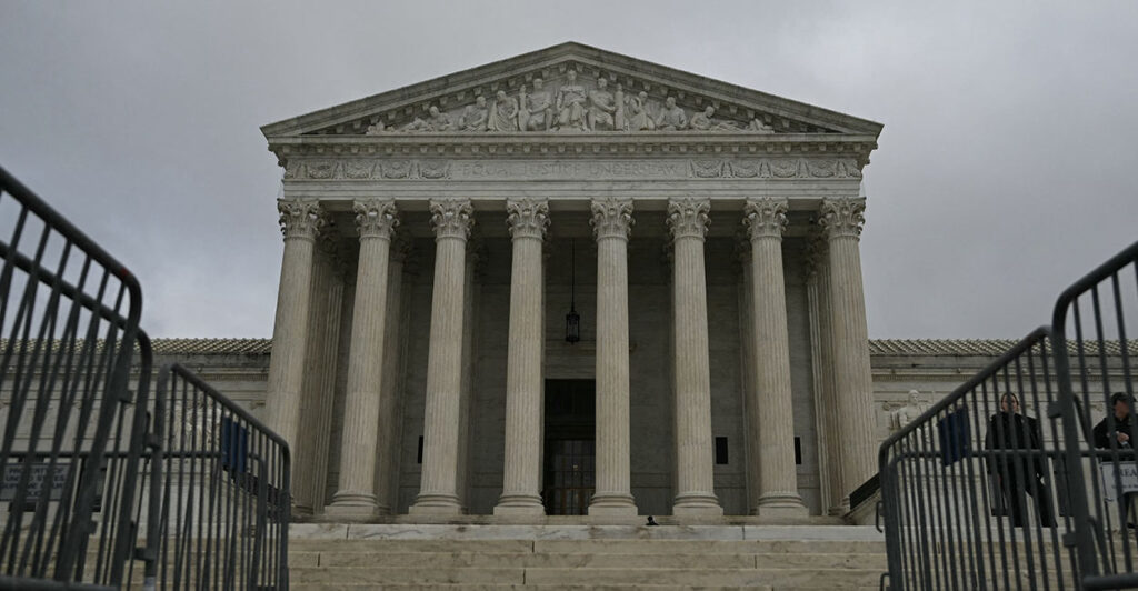A view of the US Supreme Court in Washington, DC, on February 20, 2026. The US Supreme Court ruled Friday that Donald Trump exceeded his authority in imposing a swath of tariffs that upended global trade, blocking a key tool the president has wielded to impose his economic agenda. (Photo by Drew ANGERER / AFP via Getty Images)