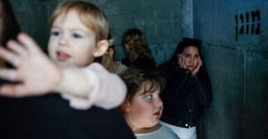 People take shelter, after missiles were launched from Iran towards Israel, following Israel and U.S. strikes on Iran, in Ashkelon, Israel, February 28, 2026. REUTERS/Amir Cohen