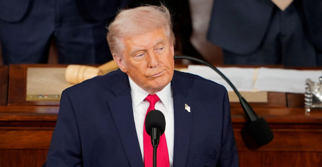 U.S. President Donald Trump looks on as he delivers the State of the Union address in the House Chamber of the U.S. Capitol in Washington, D.C., U.S., February 24, 2026. REUTERS/NATHAN HOWARD