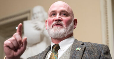 Derrick Van Orden speaks to reporters in the Capitol.