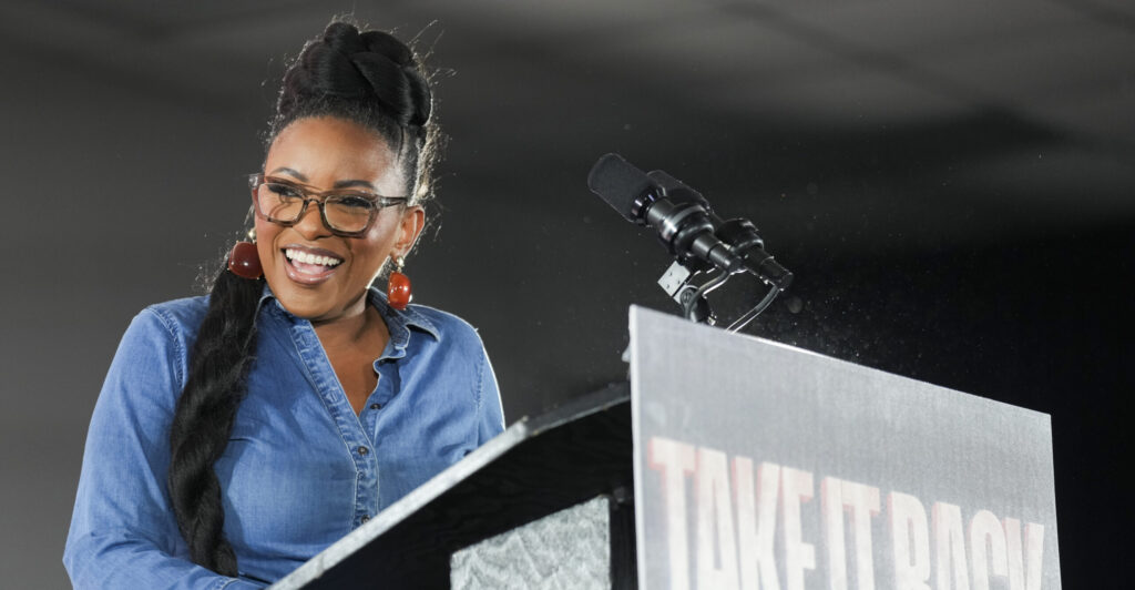 Jasmine Crockett speaks during a rally.