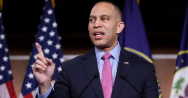 House Minority Leader Hakeem Jeffries speaks to reporters in the Capitol.