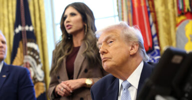 WASHINGTON, DC - NOVEMBER 17: U.S. President Donald Trump, Homeland Security Secretary Kristi Noem, and Andrew Giuliani (R) participate in a meeting of the White House Task Force on the FIFA World Cup 2026 in the Oval Office of the White House on November 17, 2025 in Washington, DC. The task force was created to oversee security, logistics, and federal government support for the 2025 Club World Cup and the 2026 FIFA World Cup, jointly hosted by the United States. (Photo by Win McNamee/Getty Images)