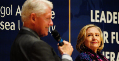 Hillary Clinton during an in-conversation with former US President Bill Clinton, the First Minister of Wales, Mark Drakeford, and the Vice-Chancellor of Swansea University, Professor Paul Boyle, about current global challenges and the importance of engaging young people in leadership roles at the Great Hall in Swansea University Bay Campus. Picture date: Thursday November 16, 2023. (Photo by Ben Birchall/PA Images via Getty Images)