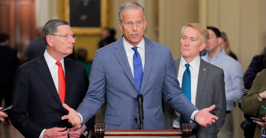 Senate Majority Leader John Thune (R-SD) speaks with reporters alongside Sen. John Barrasso (R-WY) (L) and Sen. James Lankford (R-OK) after Senate luncheons on February 25, 2026