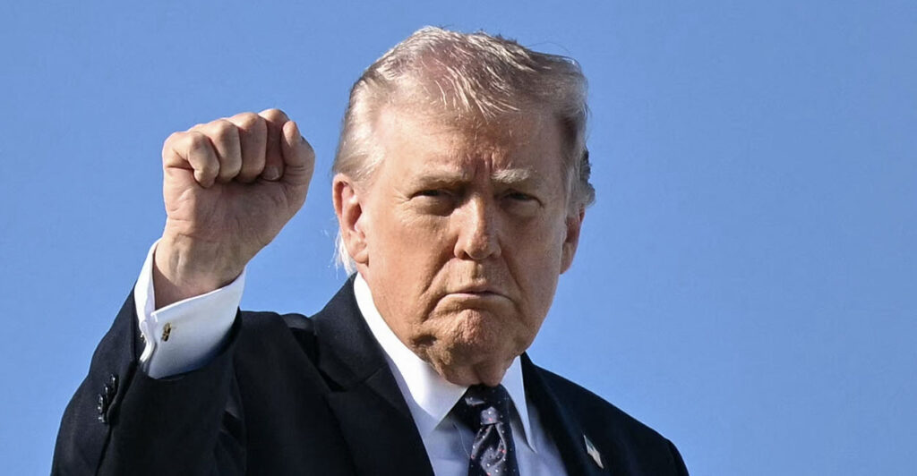 TOPSHOT - US President Donald Trump gestures as he boards Air Force One before departing Palm Beach International Airport in West Palm Beach, Florida, on March 1, 2026, on his way back to Washington, DC. The United States and Israel launched massive bombardments against Iran and killed its supreme leader on February 28, with attacks ongoing Sunday. The US military on Sunday said three service members have been killed and five seriously wounded in the war against Iran -- the first casualties announced on the US side. (Photo by Mandel NGAN / AFP via Getty Images)