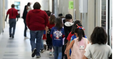 SUGAR LAND, TEXAS - NOVEMBER 11: Students walk to their classrooms at Sugar Mill Elementary in Fort Bend ISD in Sugar Land, Tuesday, Nov. 11, 2025. (Brett Coomer/Houston Chronicle via Getty Images)