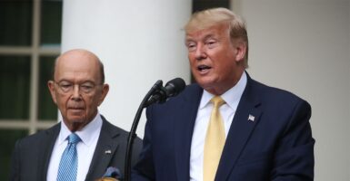 President Trump and Secretary of Commerce Wilbur Ross at a press conference.