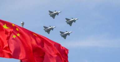 CHANGCHUN, CHINA - SEPTEMBER 19: J-20 fighter jets fly in the sky during flight performance at the aviation open-day activities of the Chinese People's Liberation Army Air Force (PLAAF) and the Changchun Air Show 2025 on September 19, 2025 in Changchun, Jilin Province of China. The event will be held from September 19 to 23 in Changchun. (Photo by VCG/VCG via Getty Images)