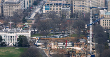 Overhead view of the White House and the massive construction of ballroom and military complex.