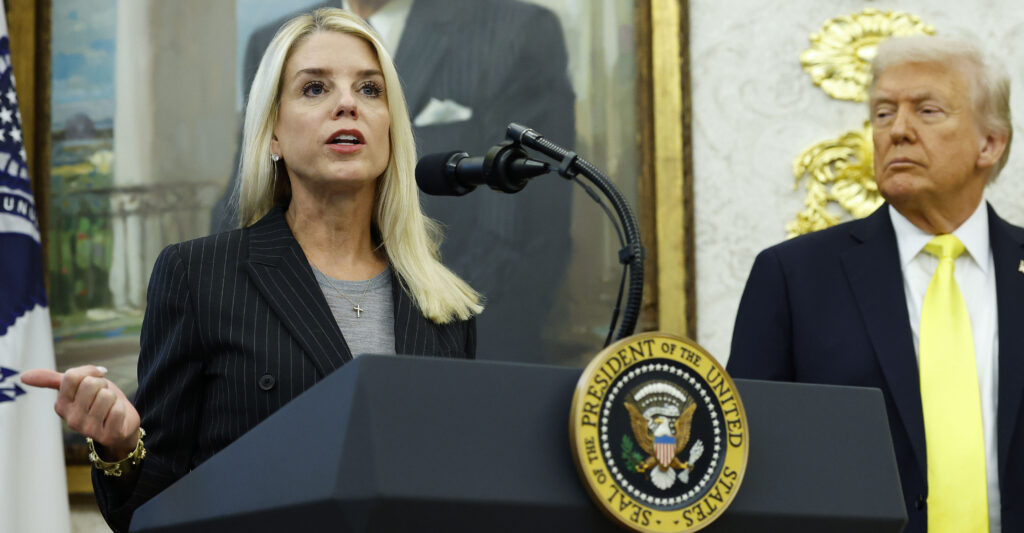 WASHINGTON, DC - OCTOBER 15: U.S. Attorney General Pam Bondi (L) speaks as U.S. President Donald Trump looks on during a press conference in the Oval Office of the White House on October 15, 2025 in Washington, DC. Trump and Federal Bureau of Investigation Director Kash Patel provided an update on the Trump administration’s progress in reducing violent crime. (Photo by Kevin Dietsch/Getty Images)