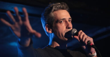 Daniel Biss on stage in Illinois.