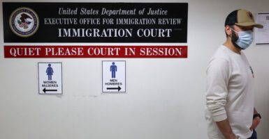 A plainclothes Immigration and Customs Enforcement (ICE) officer walks in a hallway outside of a courtroom at New York-Federal Plaza Immigration Court inside the Jacob K. Javitz Federal Building in New York City on June 6, 2025. The New York-Federal Plaza Immigration Court falls under the jurisdiction of the Executive Office for Immigration Review, a sub-agency of the US Department of Justice. US President Donald Trump has made deporting undocumented immigrants a key priority for his second term, after successfully campaigning against an alleged 