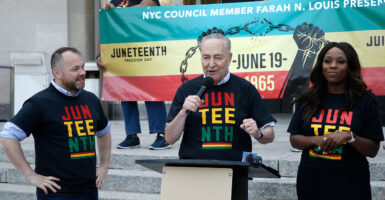 Chuck Schumer and Farah Louis.