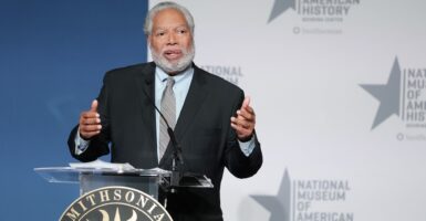 Lonnie Bunch speaking at a podium