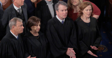 Supreme Court Chief Justice John Roberts and Associate Justices Elena Kagan, Brett Kavanaugh and Amy Coney Barrett.
