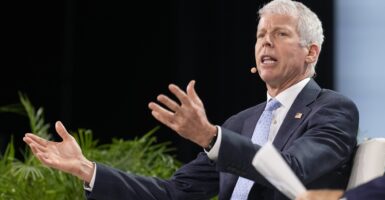 Secretary of Energy Chris Wright speaking while seated