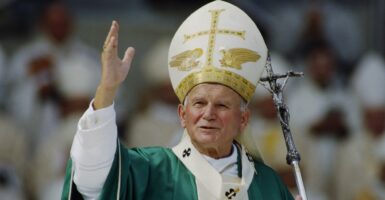 Pope John Paul II waving