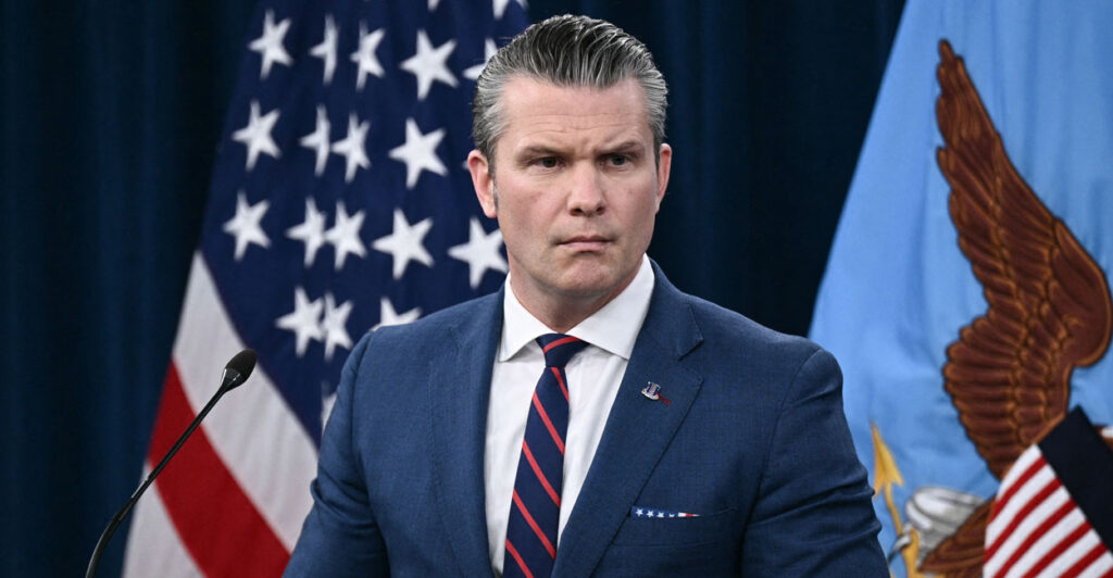 Hegseth speaks to reporters at a press conference.