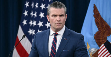Hegseth speaks to reporters at a press conference.