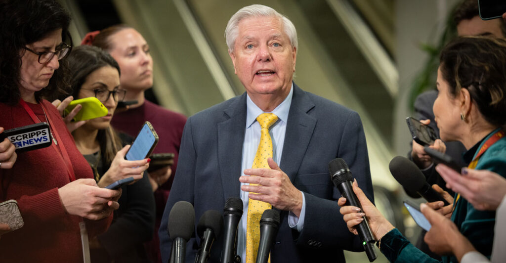 Lindsey Graham speaks to reporters at the Capitol.