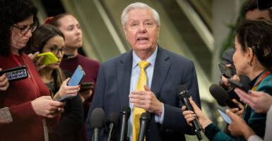 Lindsey Graham speaks to reporters at the Capitol.