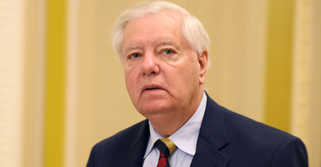 Senator Lindsey Graham walks through the Capitol.