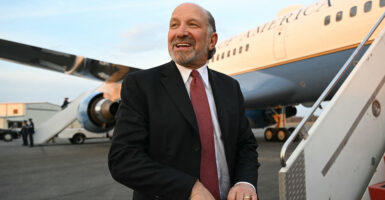 US Secretary of Commerce Howard Lutnick boards Air Force One prior to departure from Richard B. Russell Regional Airport in Rome, Georgia, February 19, 2025. Trump is returning to Washington after visiting local businesses and give remarks about the economy at a steel factory in northwest Georgia. (Photo by SAUL LOEB / AFP via Getty Images)
