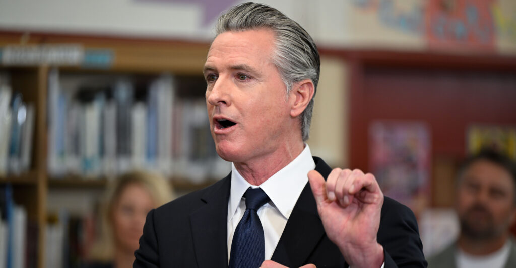 SAN LORENZO, CALIFORNIA - MARCH 18: Governor Gavin Newsom speaks during a press conference at San Lorenzo High School as he signs executive order to expand womenâs access to capital and wealth-building opportunities in partnership with First Partner Siebel Newsom in San Lorenzo, California, United States on March 18, 2026. (Photo by Tayfun Coskun/Anadolu via Getty Images)