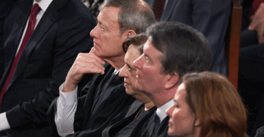 WASHINGTON, DC - FEBRUARY 24: Supreme Court Chief Justice John Roberts, Associate Justice Elena Kagan, Associate Justice Brett Kavanaugh and Associate Justice Amy Coney Barrett attend the State of the Union address during a Joint Session of Congress at the U.S. Capitol on February 24, 2026, in Washington, DC. Trump delivered his address days after the Supreme Court struck down the administration's tariff strategy and amid a U.S. military buildup in the Persian Gulf threatening Iran. (Photo by Win McNamee/Getty Images)