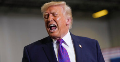 President Donald Trump speaks to reporters