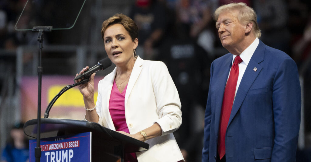 PRESCOTT VALLEY, ARIZONA - OCTOBER 13: U.S. Republican presidential nominee, former President Donald Trump invites Arizona Republican U.S. Senate candidate Kari Lake on stage during a campaign rally at Findlay Toyota Center on October 13, 2024 in Prescott Valley, Arizona. With leaders of the Border Patrol union in attendance, Trump pledged to hire 10,000 additional border patrol agents if reelected, intensifying his attacks on Democratic opponent Kamala Harris on the issue. (Photo by Rebecca Noble/Getty Images)