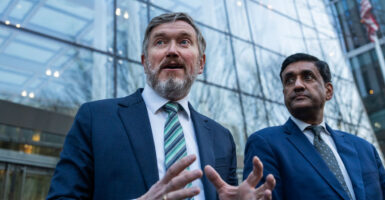 Reps. Thomas Massie, R-Ky., left, and Ro Khanna, D-Calif., conduct a news conference.