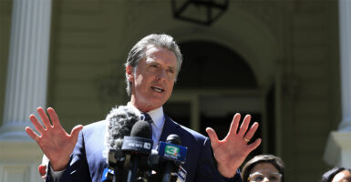 SACRAMENTO, CALIFORNIA - JULY 25: California Gov. Gavin Newsom speaks during a news conference with Texas lawmakers at the Governor’s Mansion on July 25, 2025 in Sacramento, California. California Gov. Gavin Newsom met with Texas lawmakers to push back on Texas's redistricting maneuver that aims to tilt the outcome of the 2026 midterm elections and on how California plans to respond. (Photo by Justin Sullivan/Getty Images)