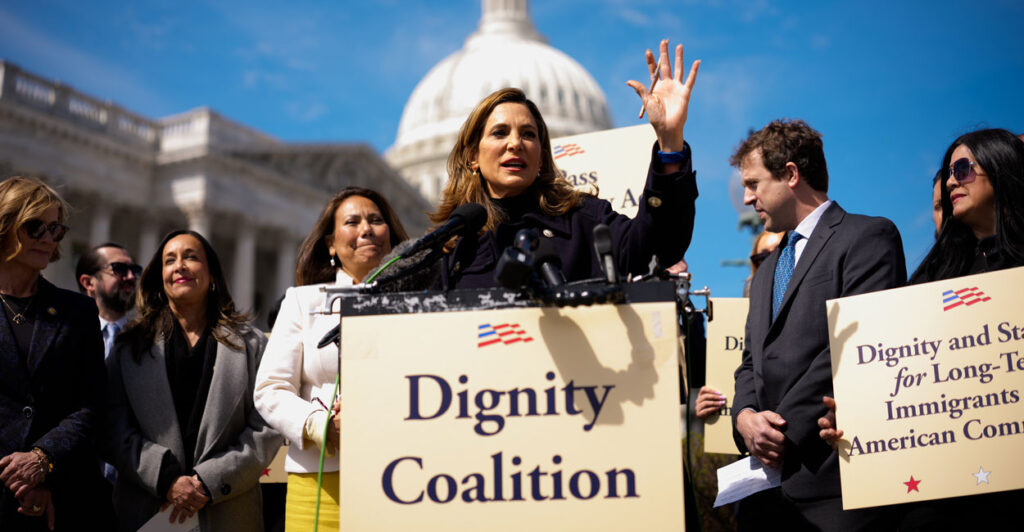 Rep. Maria Elvira Salazar (R-FL) (C), accompanied by Rep. Veronica Escobar (D-TX) (C-L), speaks at a Dignity Coalition news conference on Capitol Hill.