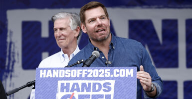 WASHINGTON, DC - APRIL 05: Rep. Eric Swalwell (D-CA) speaks during the Hands Off! day of action against the Trump administration and Elon Musk on April 05, 2025 in Washington, DC. (Photo by Paul Morigi/Getty Images for Community Change Action)