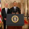 Then-President Barack Obama speaks to the nation from behind a podium, with Vice President Joe Biden behind him.